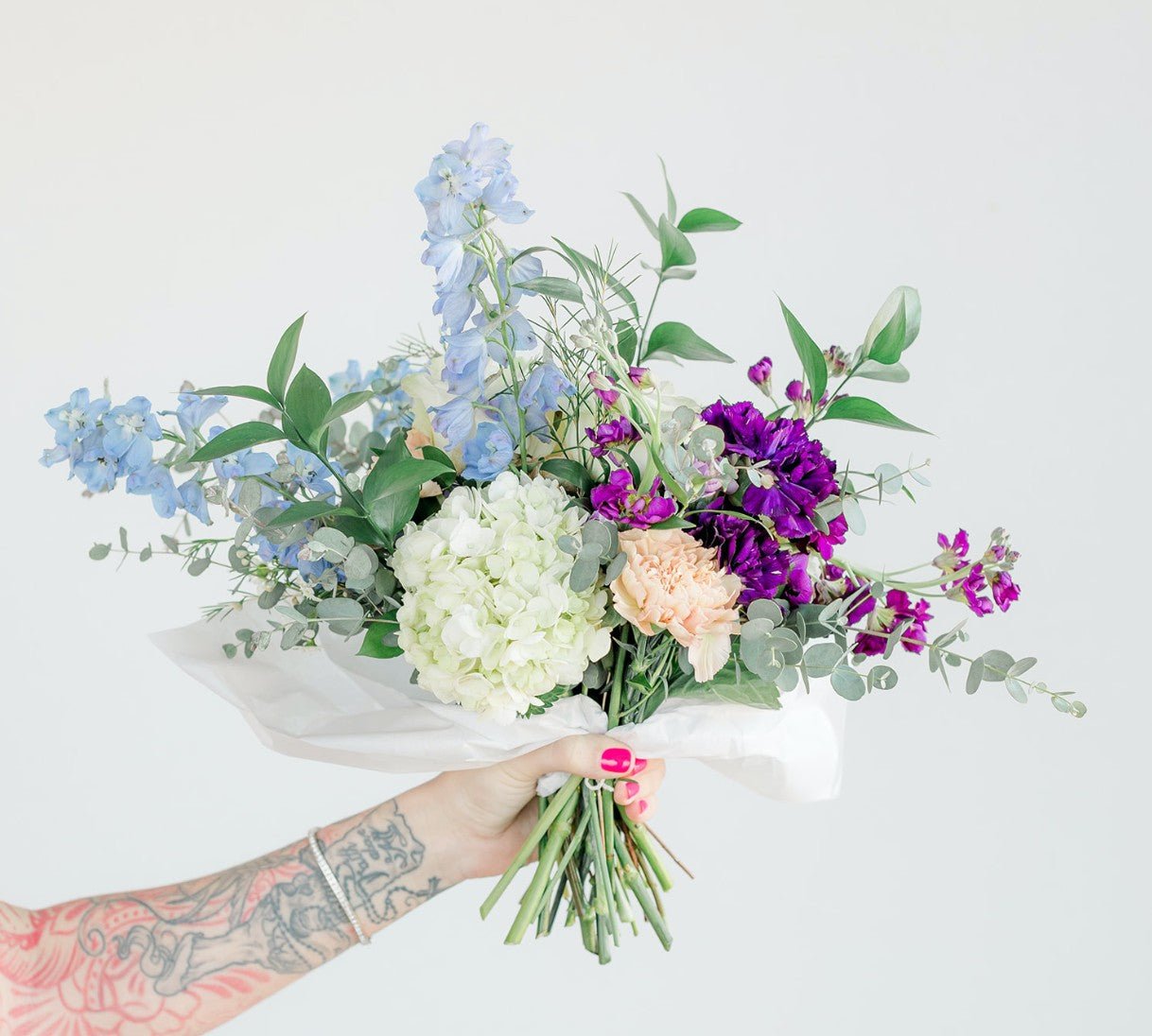 Wrapped Smokeshow - Floret + Foliage Flower delivery in Fargo, North Dakota